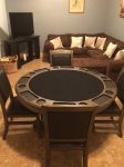 Downstairs family room table converts into a poker table.